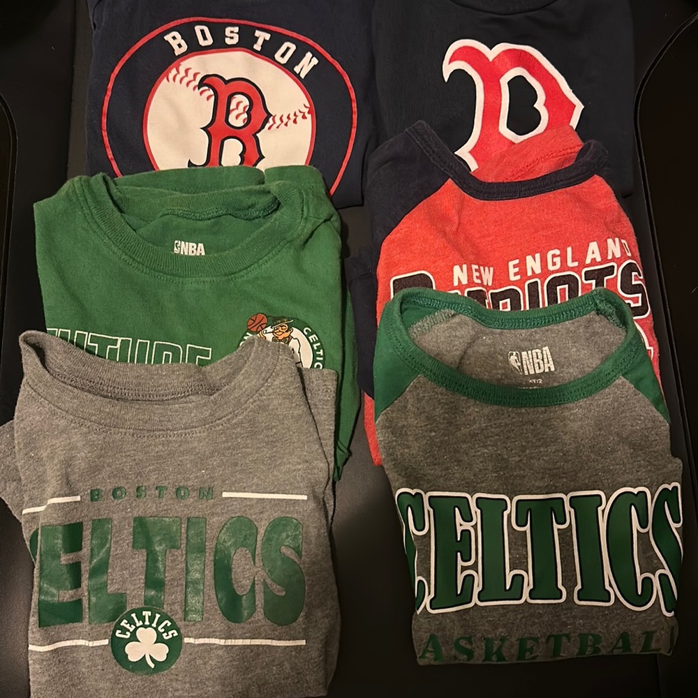 Assorted Boston sports t-shirts